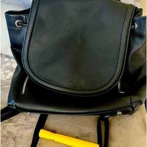 INC backpack black 2 front side zipper pockets and one back zipper pocket